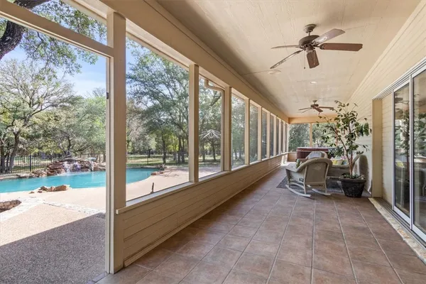 a view of a table and chairs in the garden