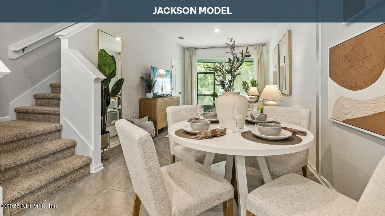 171 Palmetto Rdg Road St. Augustine, FL 32095 - Photo 9 of 39 a view of a dining room with furniture and wooden floor