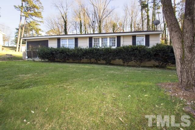 1212 North King Charles Road Raleigh, NC 27610 - Photo 1 of 16 a front view of a house with garden
