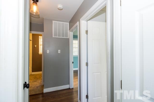 1212 North King Charles Road Raleigh, NC 27610 - Photo 13 of 16 a view of a bathroom from a hallway