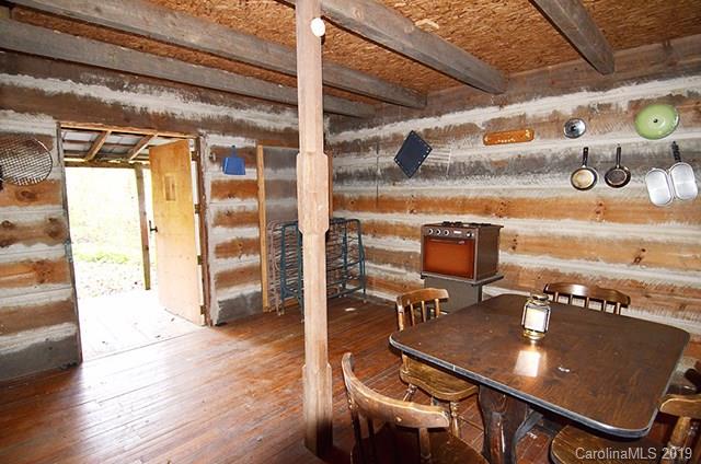V/l Henry Mc Call Road, Unit NONE Marion, NC 28752 - Photo 17 of 18 a room with chairs and wooden floor
