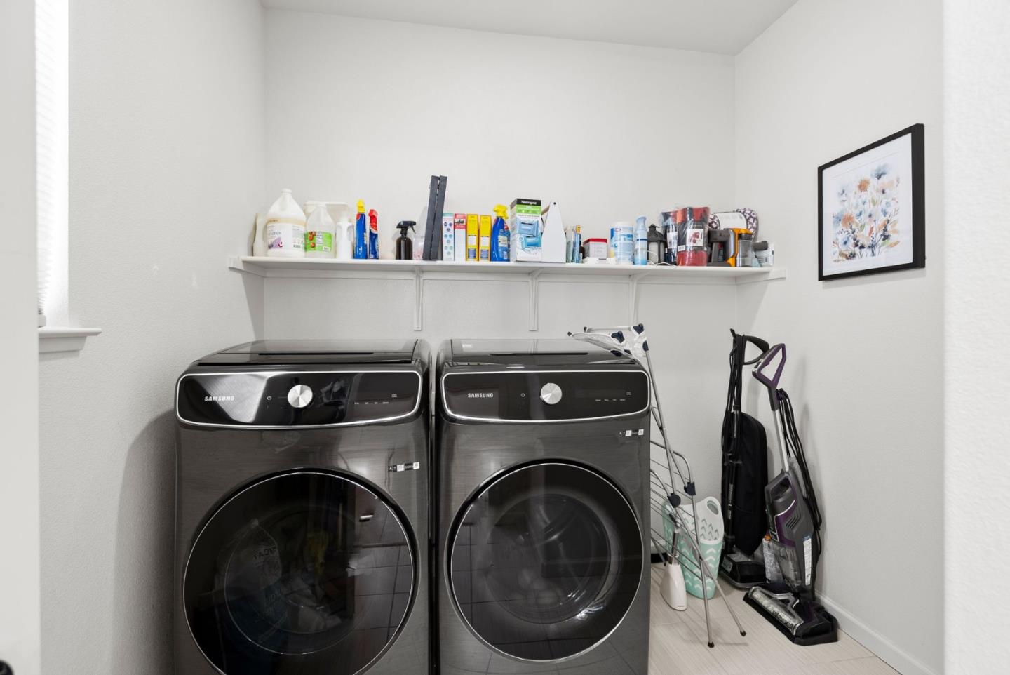 94 Caspian Way Gilroy, CA 95020 - Photo 20 of 40 a utility room with dryer washer and a view of kitchen