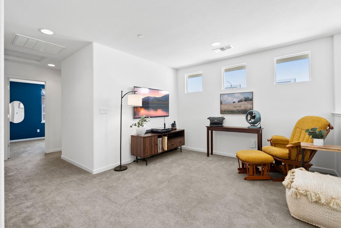 94 Caspian Way Gilroy, CA 95020 - Photo 21 of 40 a bed room with furniture and a lamp