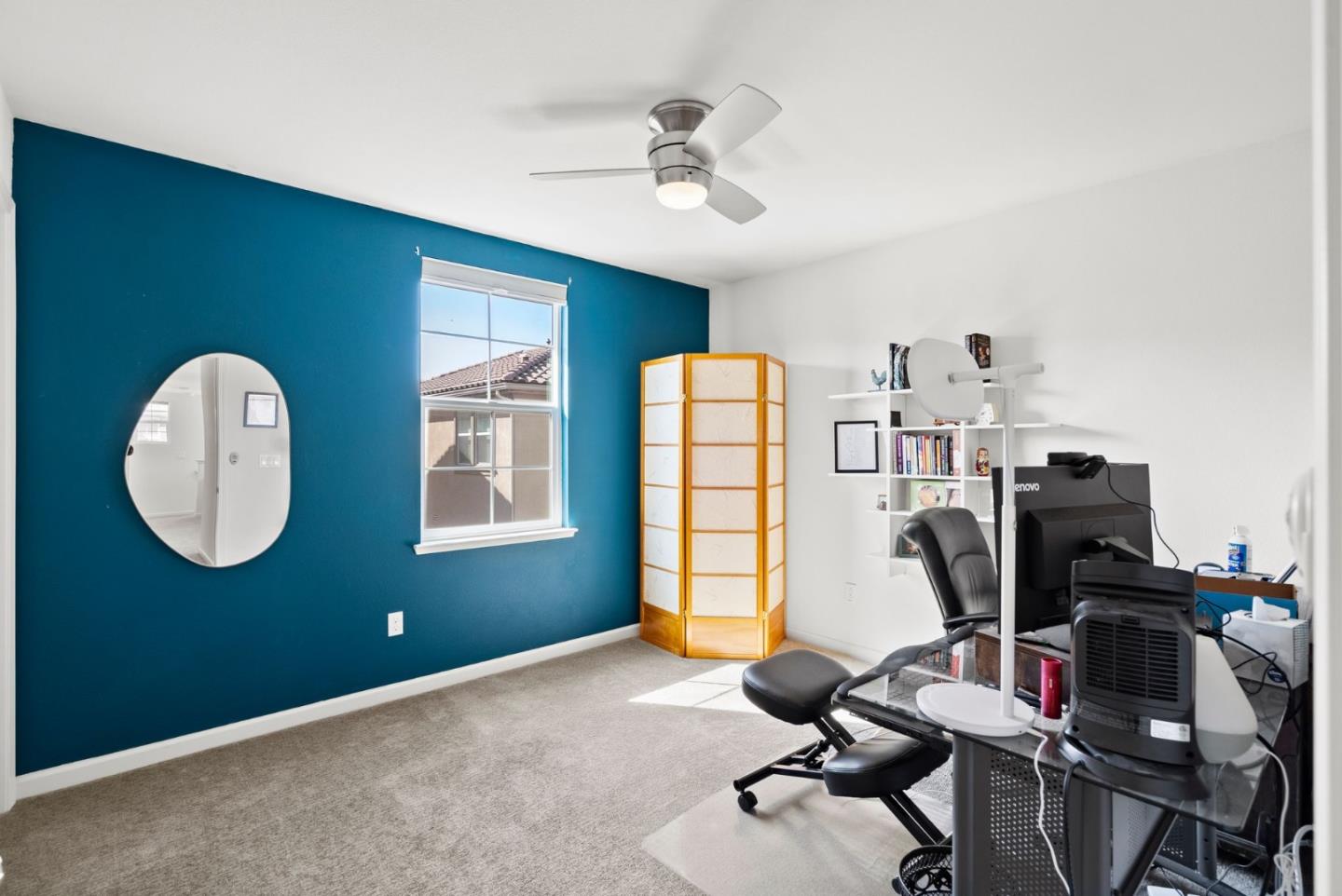 94 Caspian Way Gilroy, CA 95020 - Photo 23 of 40 a view of a workspace with furniture and a window