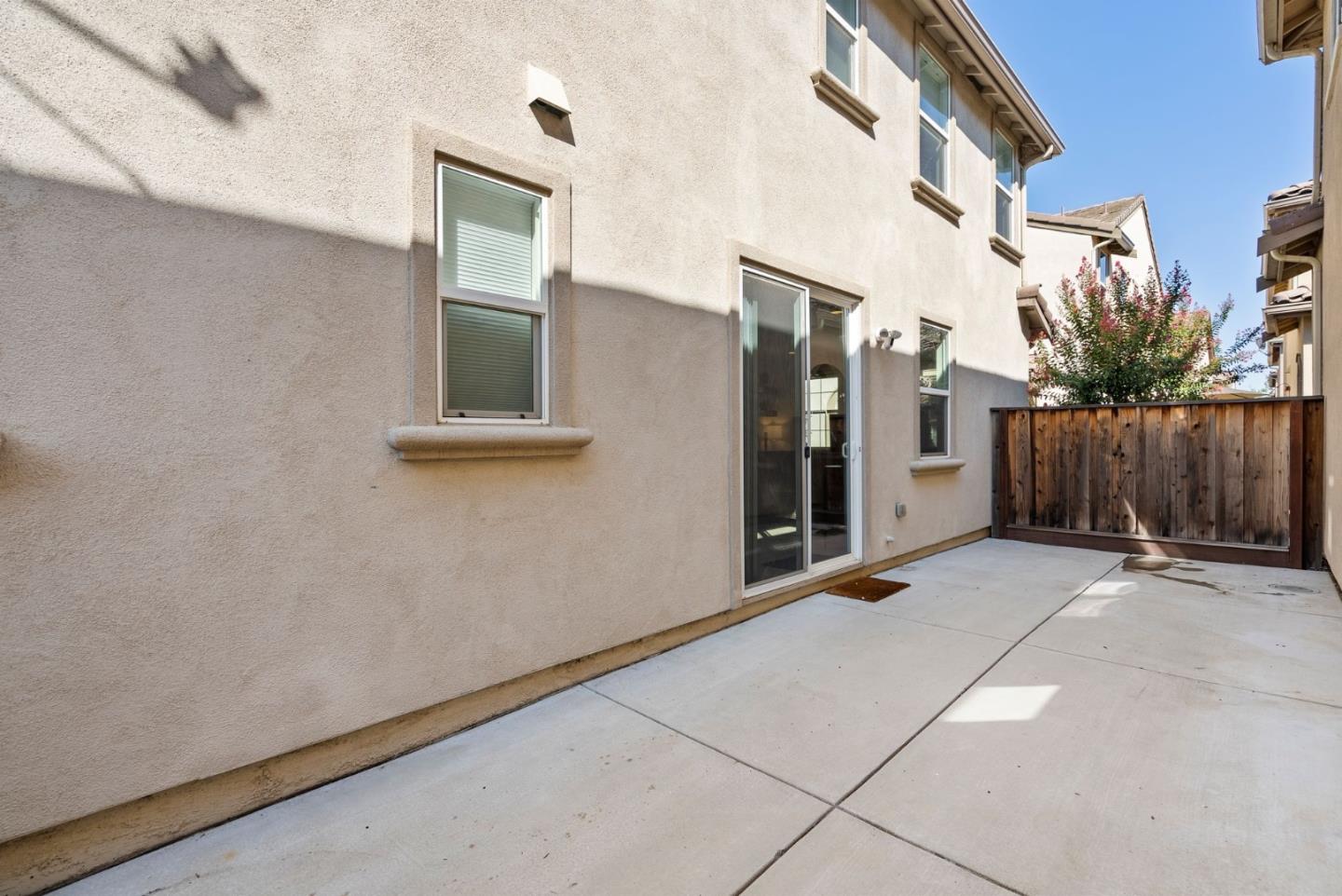 94 Caspian Way Gilroy, CA 95020 - Photo 33 of 40 a view of an entryway with a building