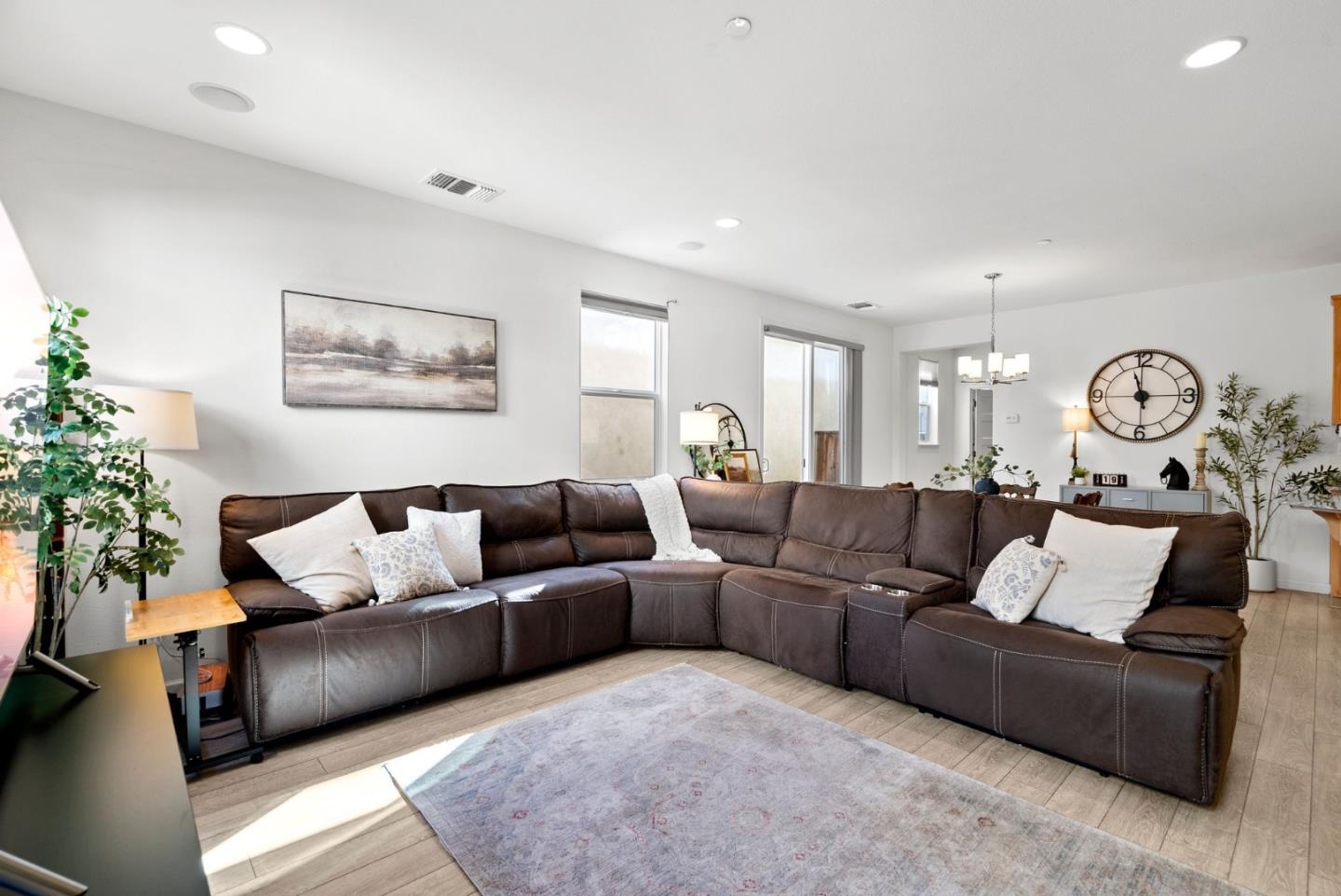 94 Caspian Way Gilroy, CA 95020 - Photo 8 of 40 a living room with furniture and a large window
