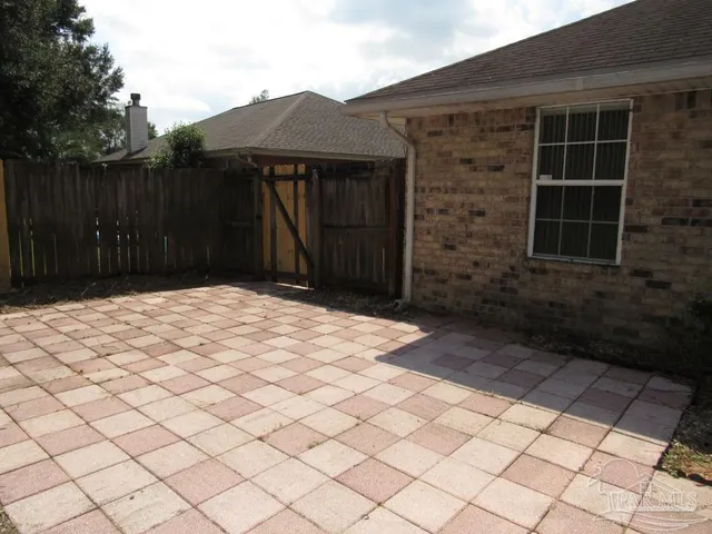 a view of a yard with trees