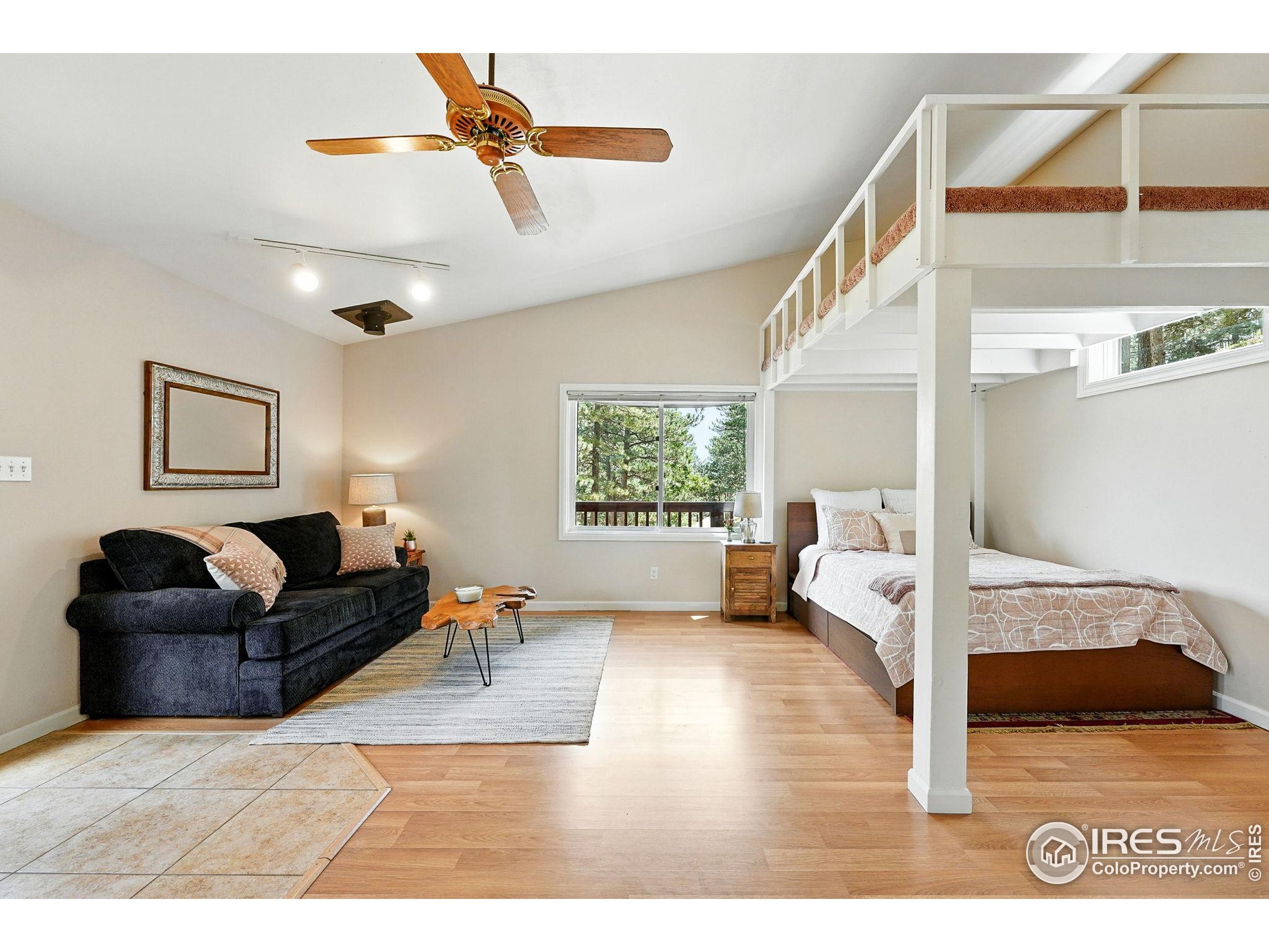 178 Balsam Lane Boulder, CO 80304 - Photo 30 of 40 a living room with furniture and a window