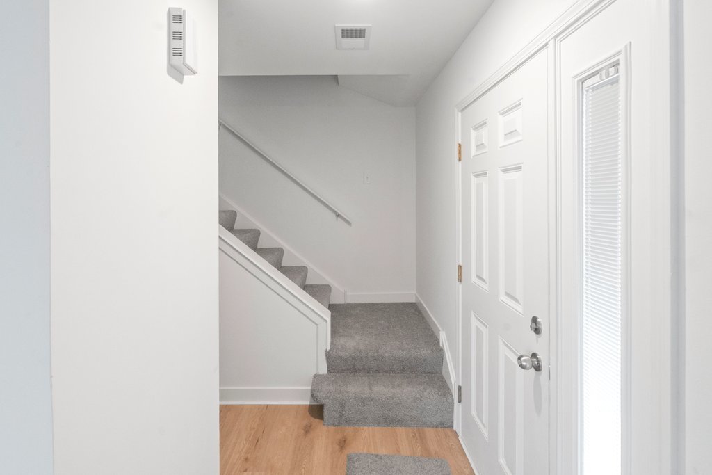 7050 Olde Gatehouse Road Tinley Park, IL 60477 - Photo 18 of 37 a view of entryway with stairs