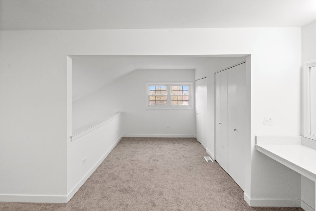 7050 Olde Gatehouse Road Tinley Park, IL 60477 - Photo 23 of 37 a view of an empty room with a window