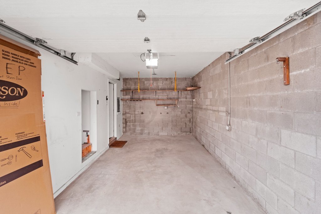 7050 Olde Gatehouse Road Tinley Park, IL 60477 - Photo 37 of 37 a view of a hallway with a chandelier