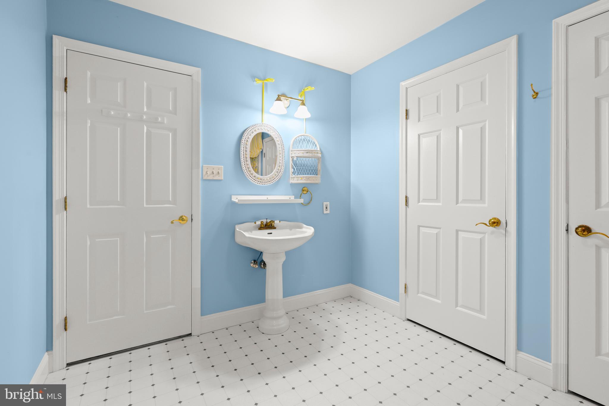 5602 Patterson Road Baldwin, MD 21013 - Photo 75 of 88 Bathroom #3 with pedestal sink & access to storage