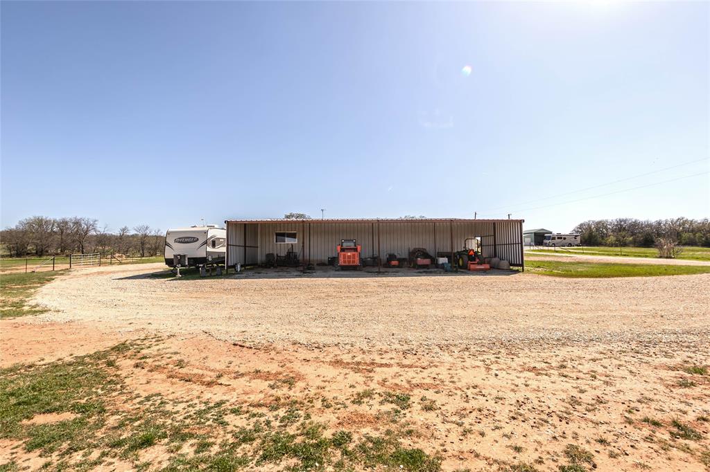 978 Longbranch Road Nocona, TX 76255 - Photo 29 of 40 a view of a swimming pool and an ocean view