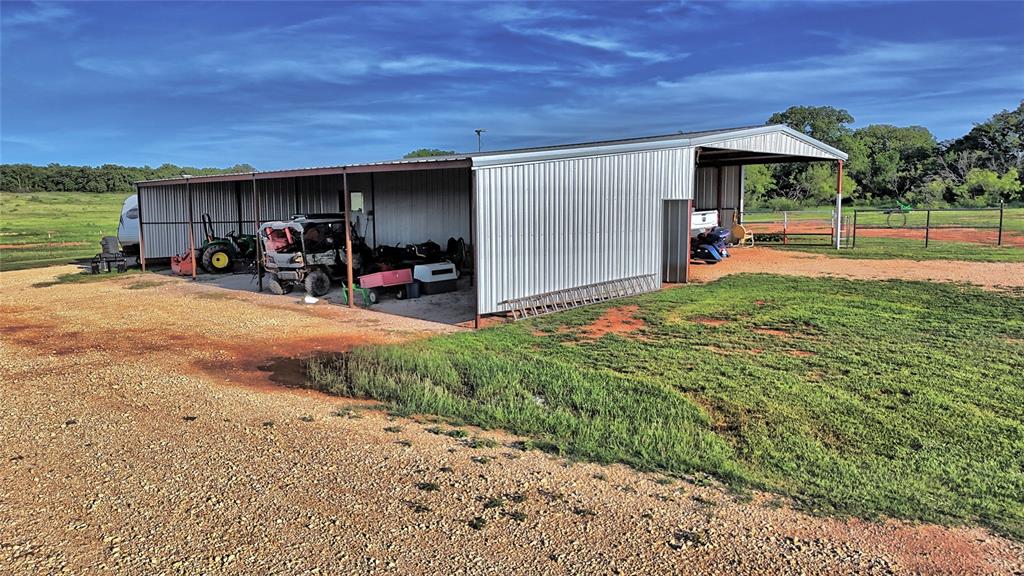 978 Longbranch Road Nocona, TX 76255 - Photo 31 of 40 a view of a backyard