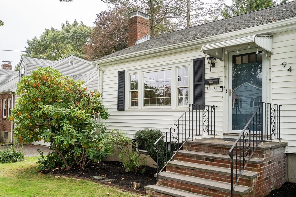 94 Stowecroft Road Arlington, MA 02474 - Photo 3 of 42 a front view of a house with a garden