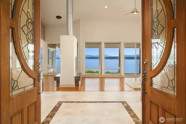 a view of staircase with large windows