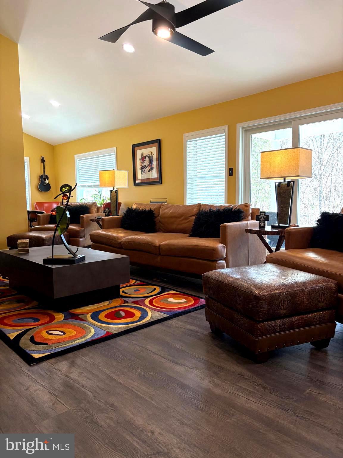 412 Greentree Road Sewell, NJ 08080 - Photo 2 of 5 a living room with furniture a table and a window