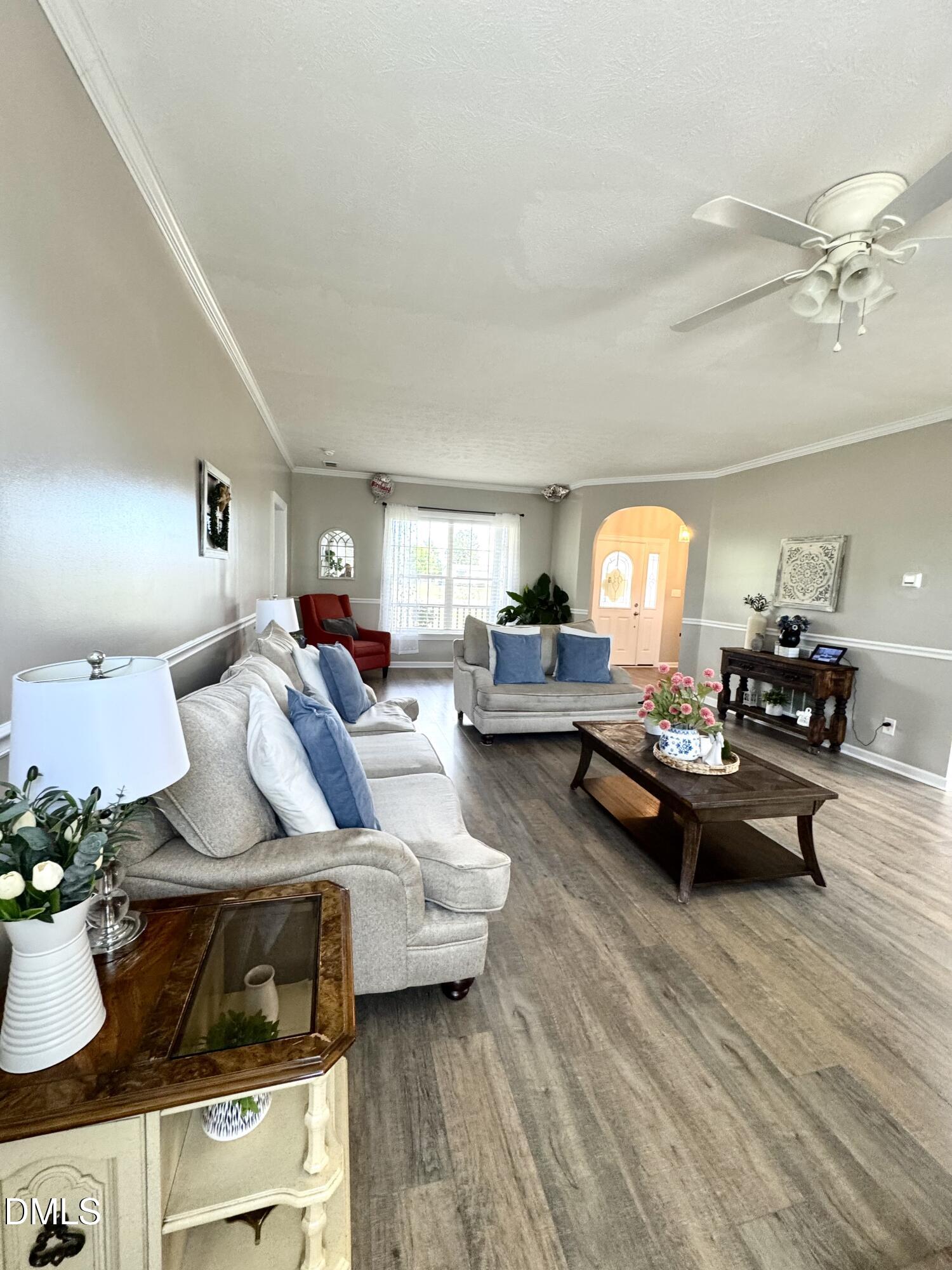 640 Tart Town Road Dunn, NC 28334 - Photo 11 of 71 a living room with furniture and a wooden floor