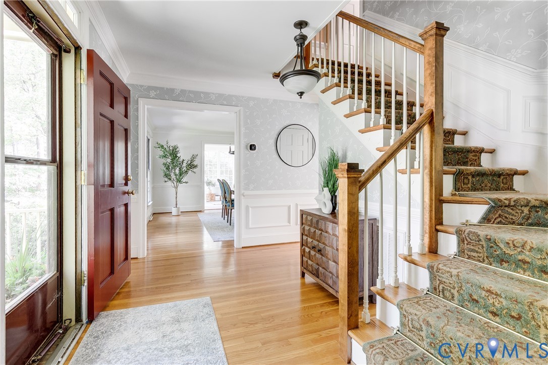 509 Wadeward Road Henrico, VA 23229 - Photo 9 of 59 a view of a hallway with wooden floor and windows