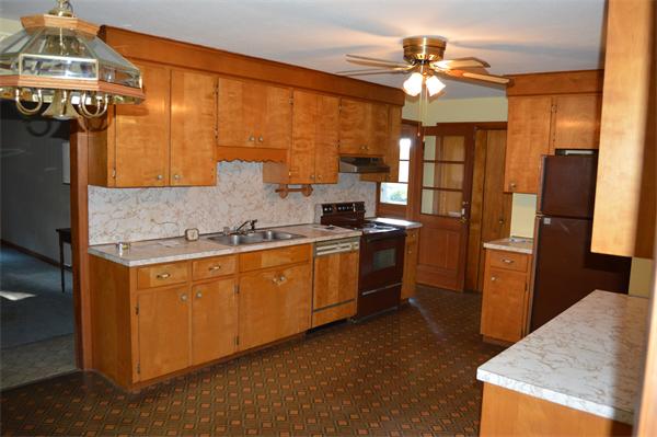 454 Dipping Hole Road Wilbraham, MA 01095 - Photo 4 of 14 a kitchen with stainless steel appliances granite countertop a sink refrigerator and cabinets