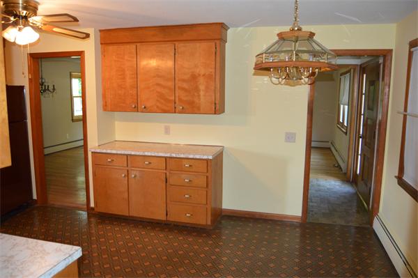 454 Dipping Hole Road Wilbraham, MA 01095 - Photo 5 of 14 a kitchen with stainless steel appliances granite countertop a refrigerator a stove and a sink with granite countertops