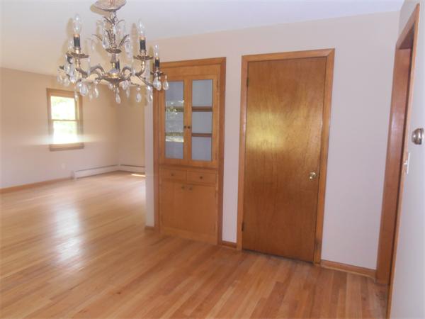 454 Dipping Hole Road Wilbraham, MA 01095 - Photo 6 of 14 wooden floor in an empty room with a window