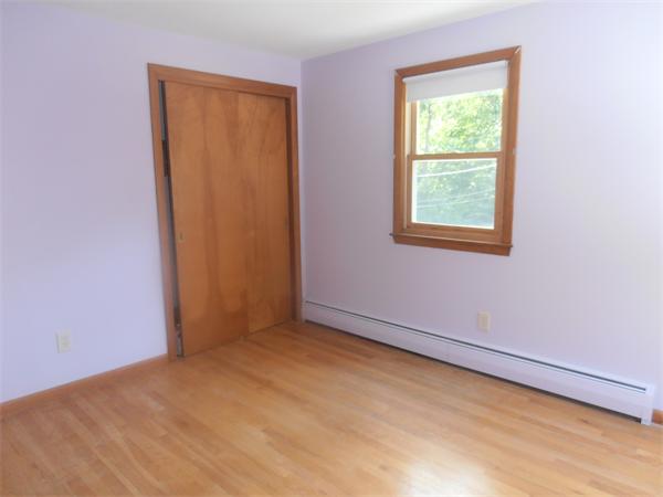 454 Dipping Hole Road Wilbraham, MA 01095 - Photo 8 of 14 an empty room with windows