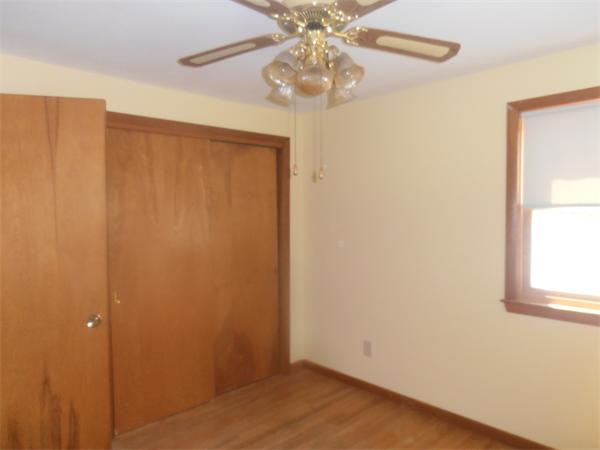 454 Dipping Hole Road Wilbraham, MA 01095 - Photo 9 of 14 an empty room with windows and fan