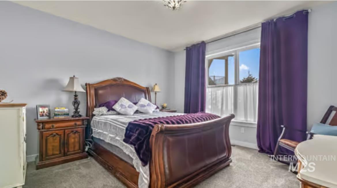 16353 Brunello Court Caldwell, ID 83607 - Photo 15 of 45 Bedroom with light carpet
