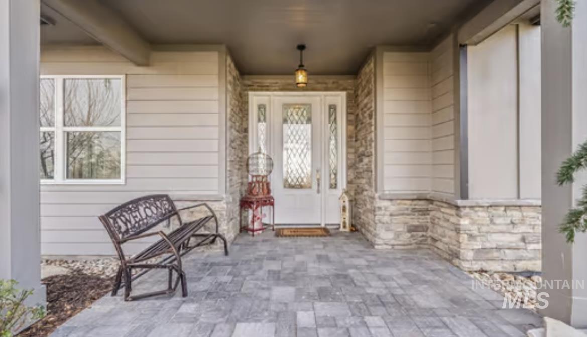 16353 Brunello Court Caldwell, ID 83607 - Photo 2 of 34 Property entrance with stone siding