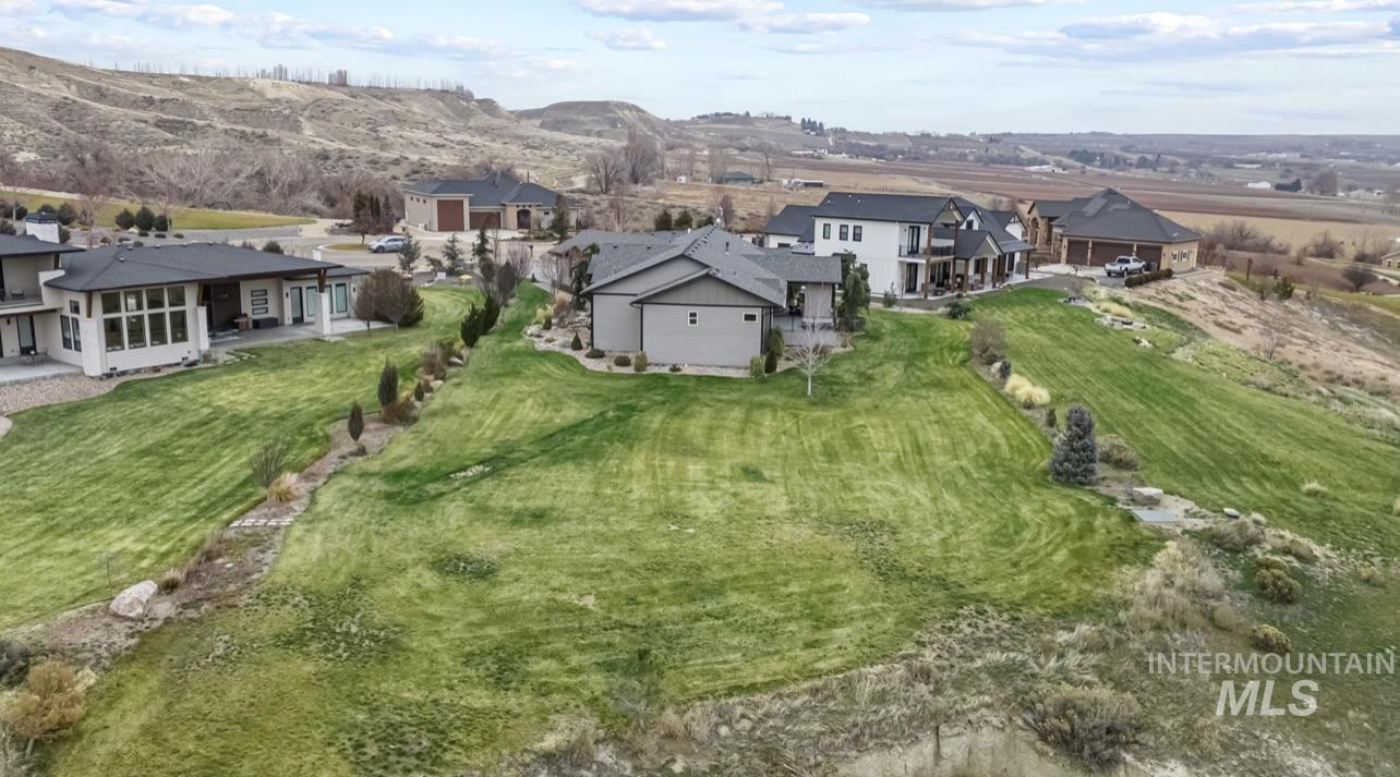 16353 Brunello Court Caldwell, ID 83607 - Photo 40 of 45 Aerial perspective of suburban area