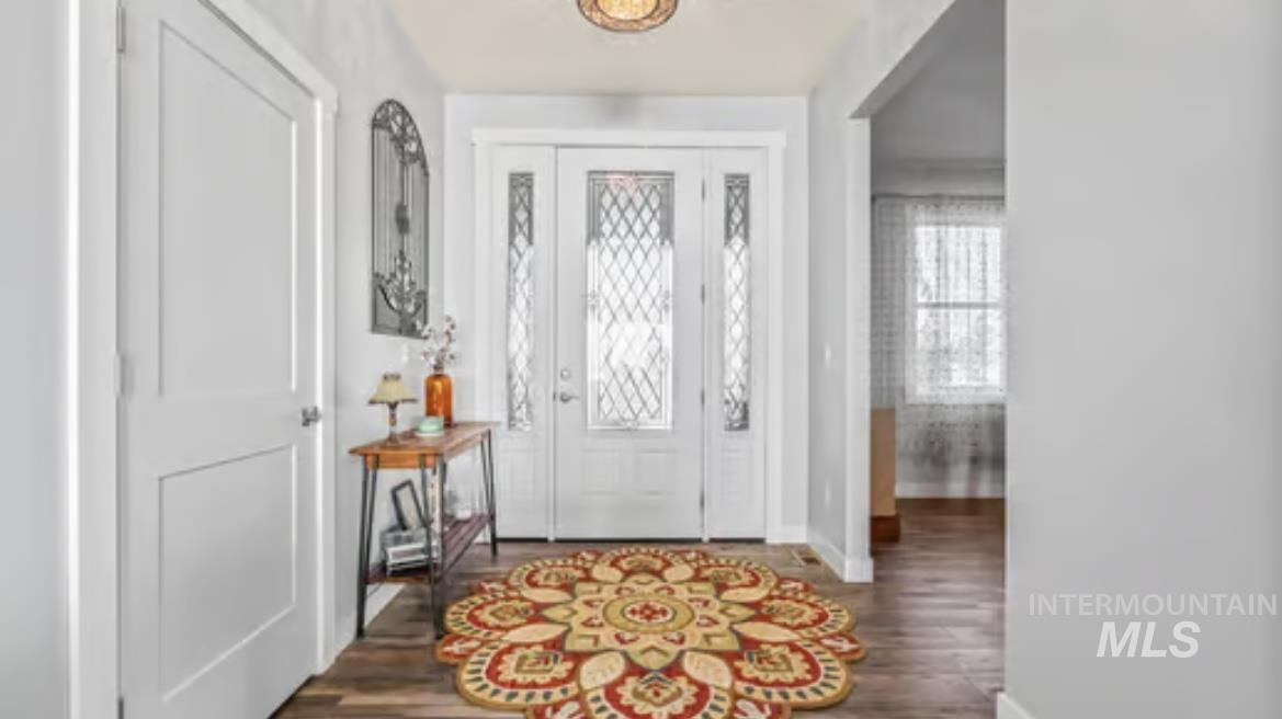 16353 Brunello Court Caldwell, ID 83607 - Photo 4 of 34 Foyer with dark wood-type flooring