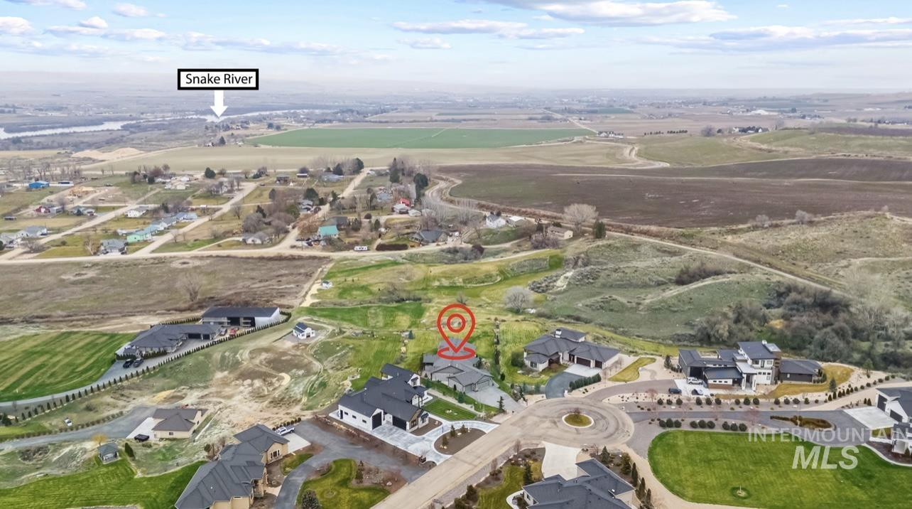 16353 Brunello Court Caldwell, ID 83607 - Photo 45 of 45 Aerial perspective of suburban area