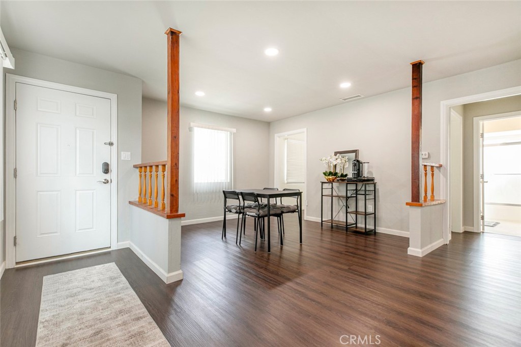 13166 Aztec Street Sylmar, CA 91342 - Photo 11 of 48 a view of dining room with furniture and wooden floor