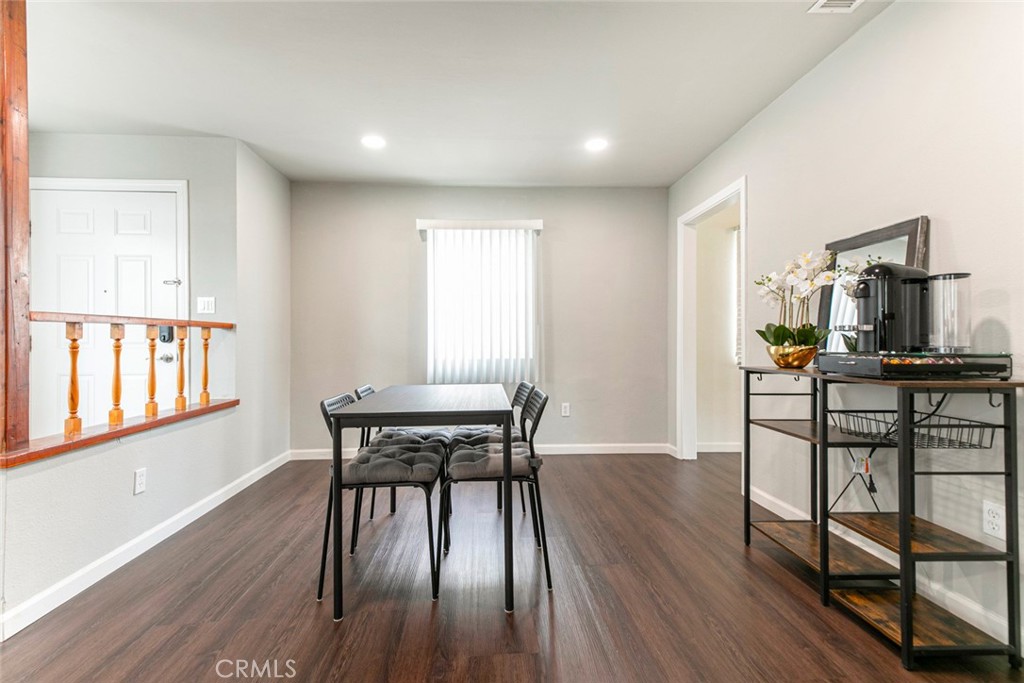 13166 Aztec Street Sylmar, CA 91342 - Photo 12 of 48 a view of a dining room with furniture and a window