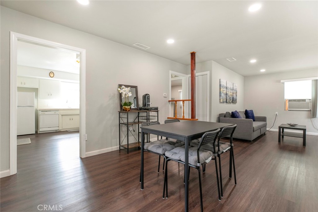 13166 Aztec Street Sylmar, CA 91342 - Photo 13 of 48 a view of a dining room with furniture and wooden floor