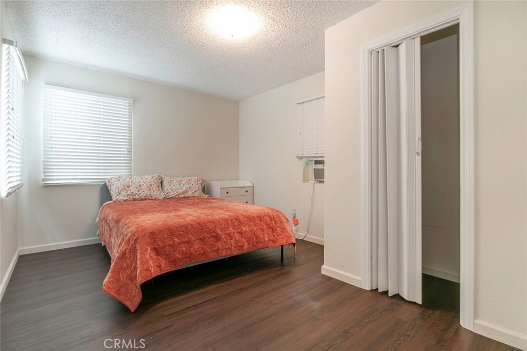 13166 Aztec Street Sylmar, CA 91342 - Photo 23 of 48 a bed sitting in a bedroom next to a window