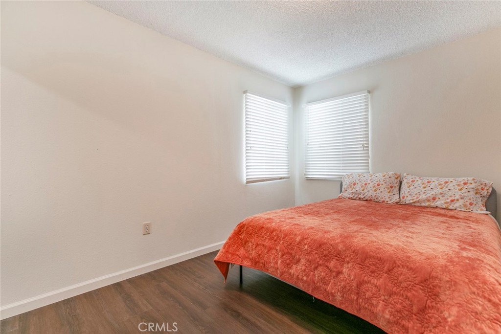 13166 Aztec Street Sylmar, CA 91342 - Photo 24 of 48 a bedroom with a bed and a window