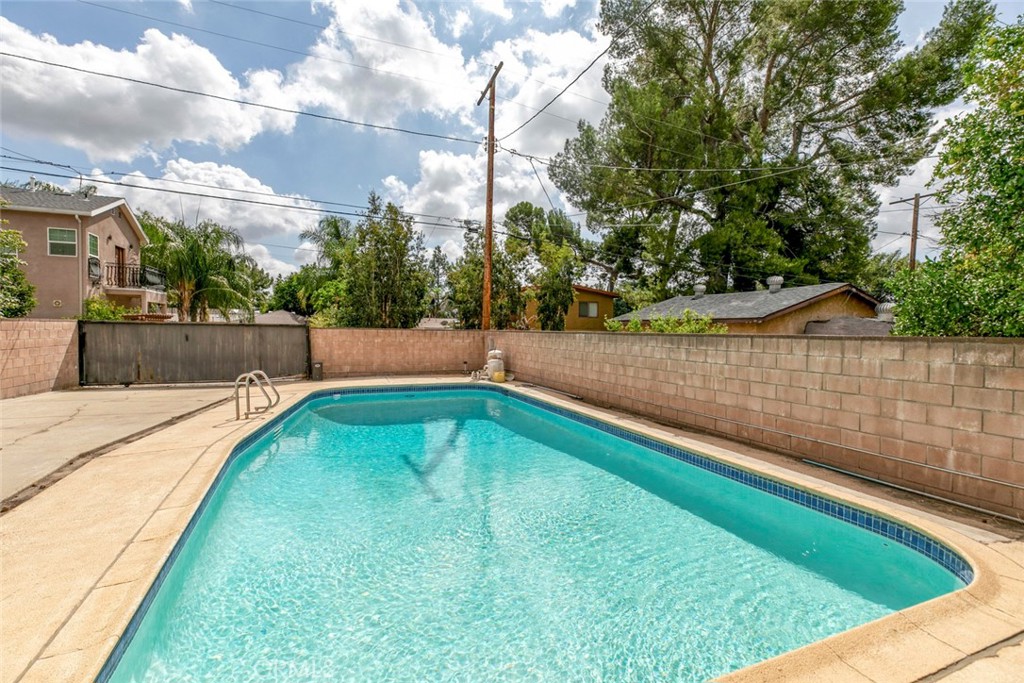 13166 Aztec Street Sylmar, CA 91342 - Photo 34 of 48 a view of swimming pool with a yard