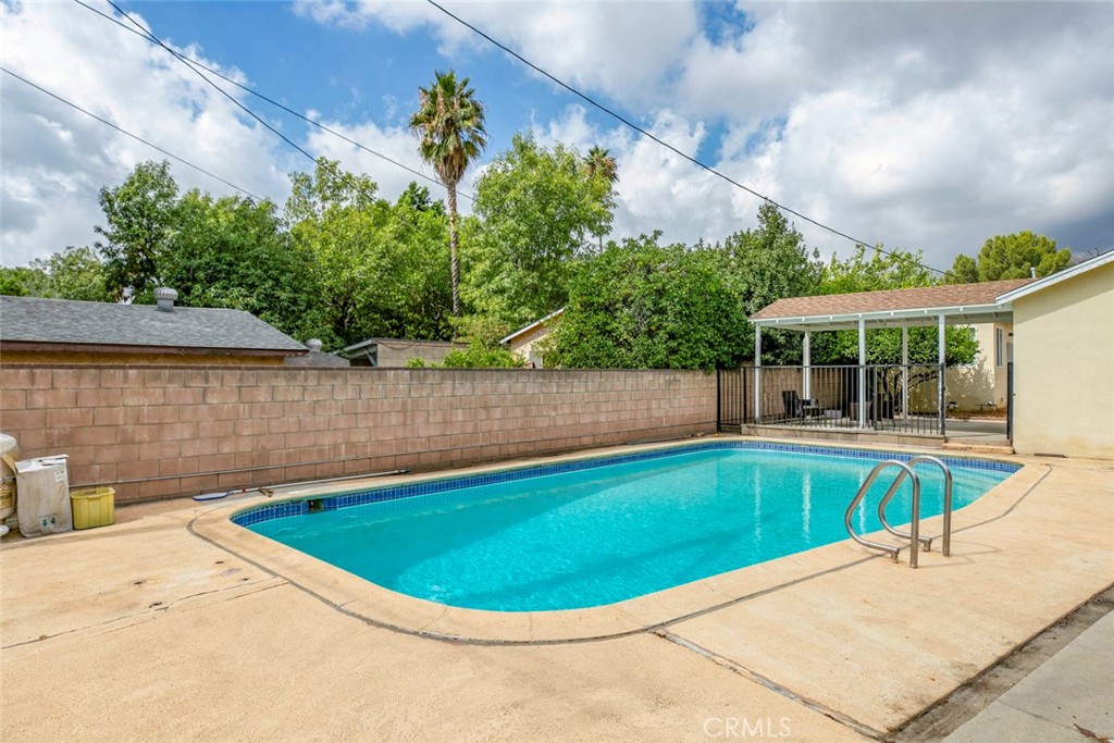 13166 Aztec Street Sylmar, CA 91342 - Photo 40 of 48 a view of a swimming pool with a patio