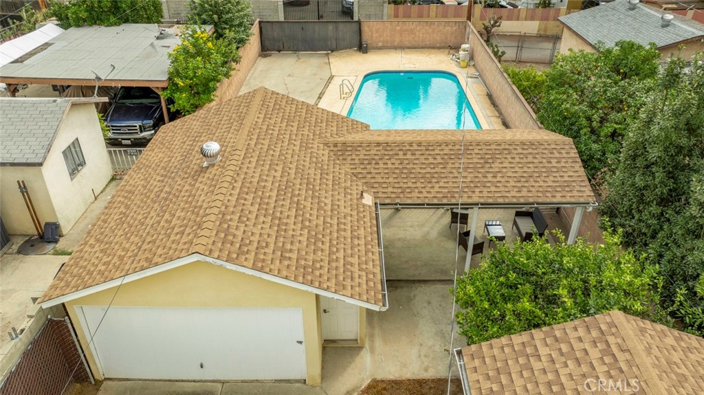 13166 Aztec Street Sylmar, CA 91342 - Photo 44 of 48 an aerial view of a house with swimming pool