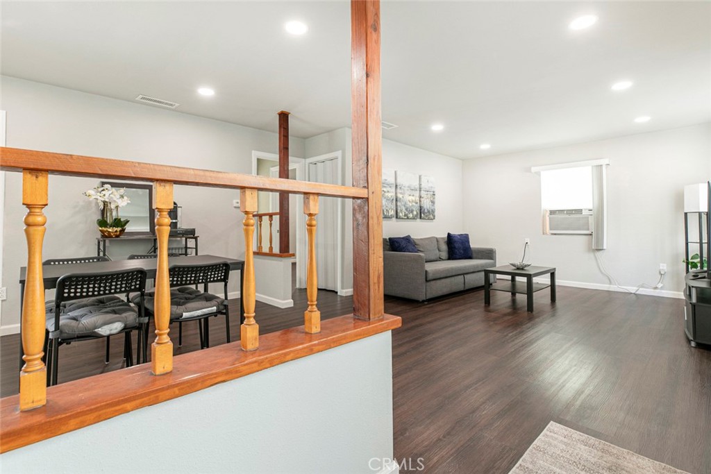 13166 Aztec Street Sylmar, CA 91342 - Photo 7 of 48 a living room with furniture and a flat screen tv