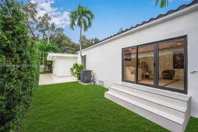 a house view with a garden space