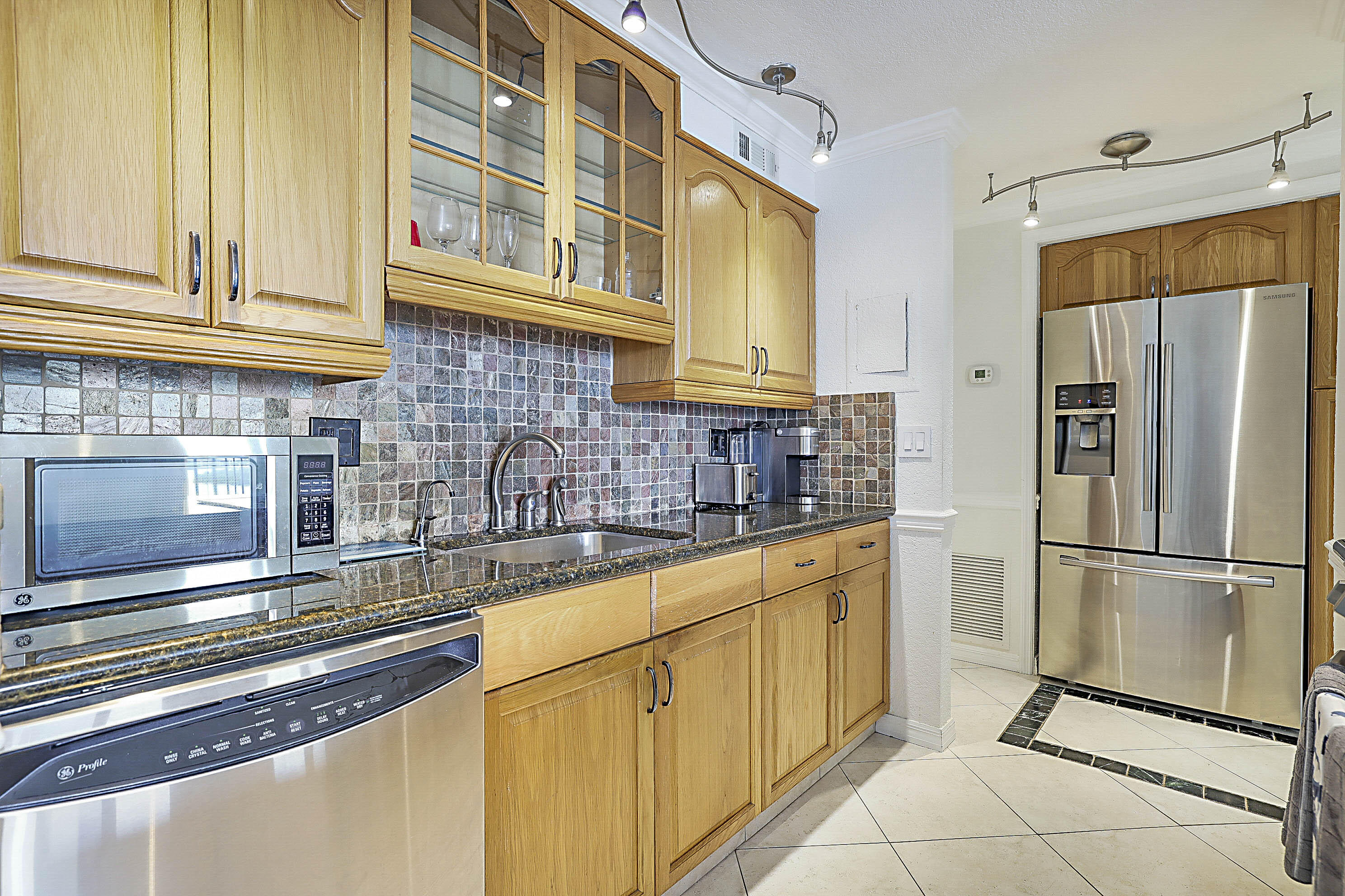 2121 North Ocean Boulevard, Unit 1105W Boca Raton, FL 33431 - Photo 11 of 58 Remodeled kitchen