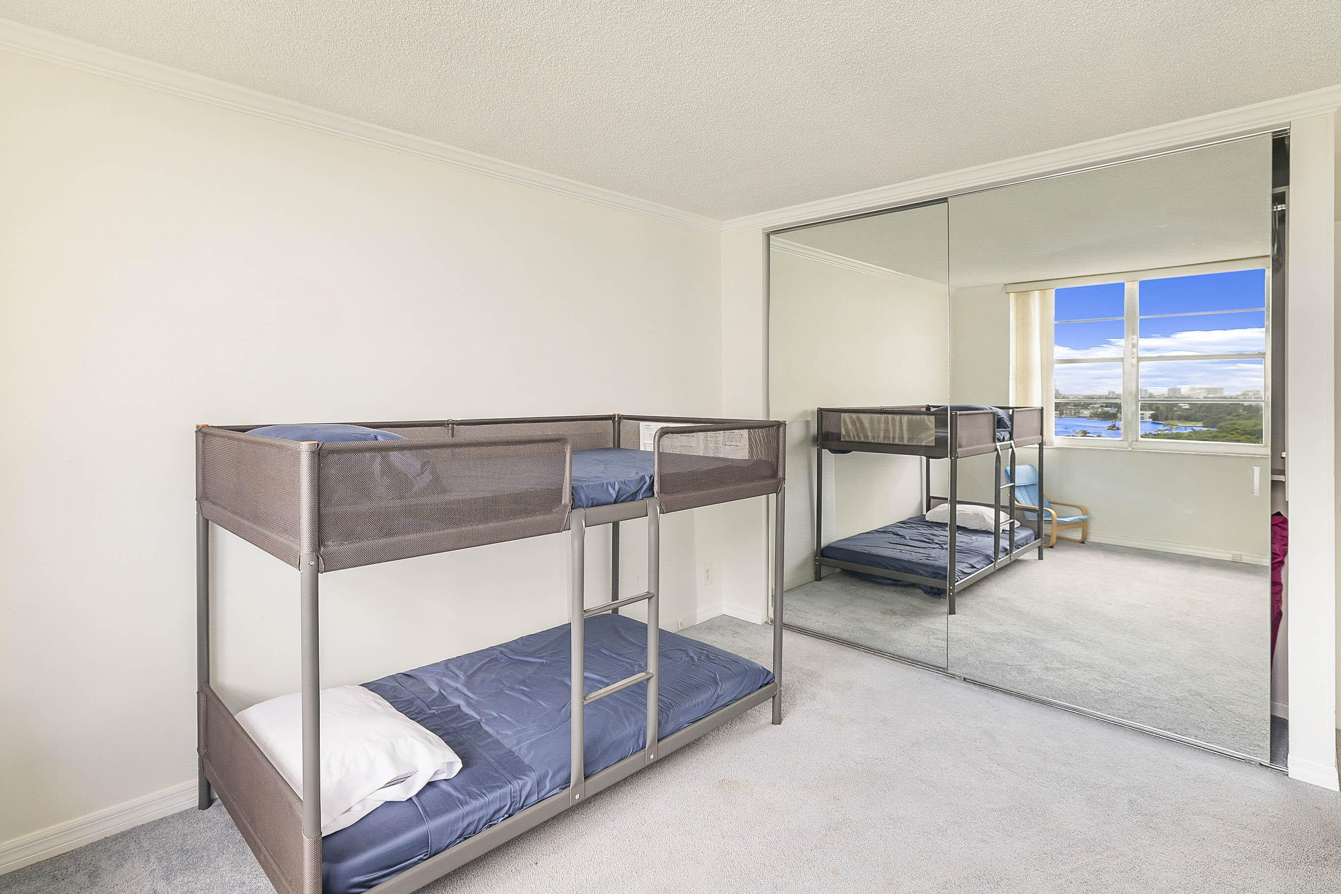 2121 North Ocean Boulevard, Unit 1105W Boca Raton, FL 33431 - Photo 26 of 58 Guest bedroom