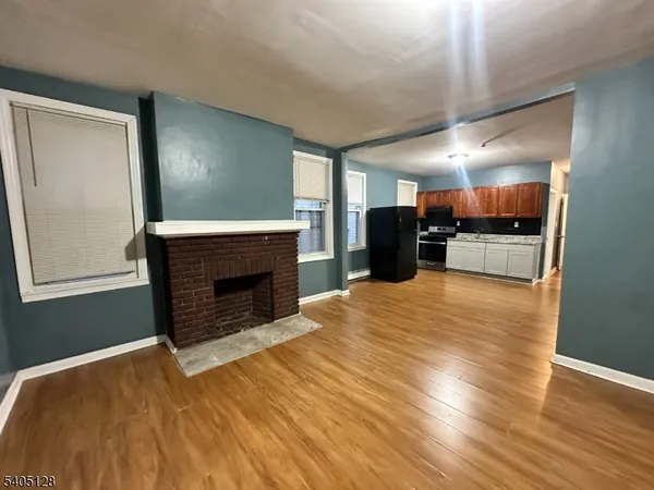 a view of a livingroom with a fireplace