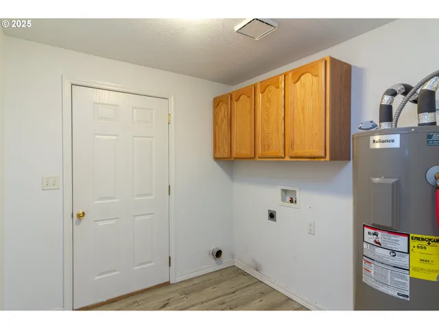 a view of kitchen with wooden floor
