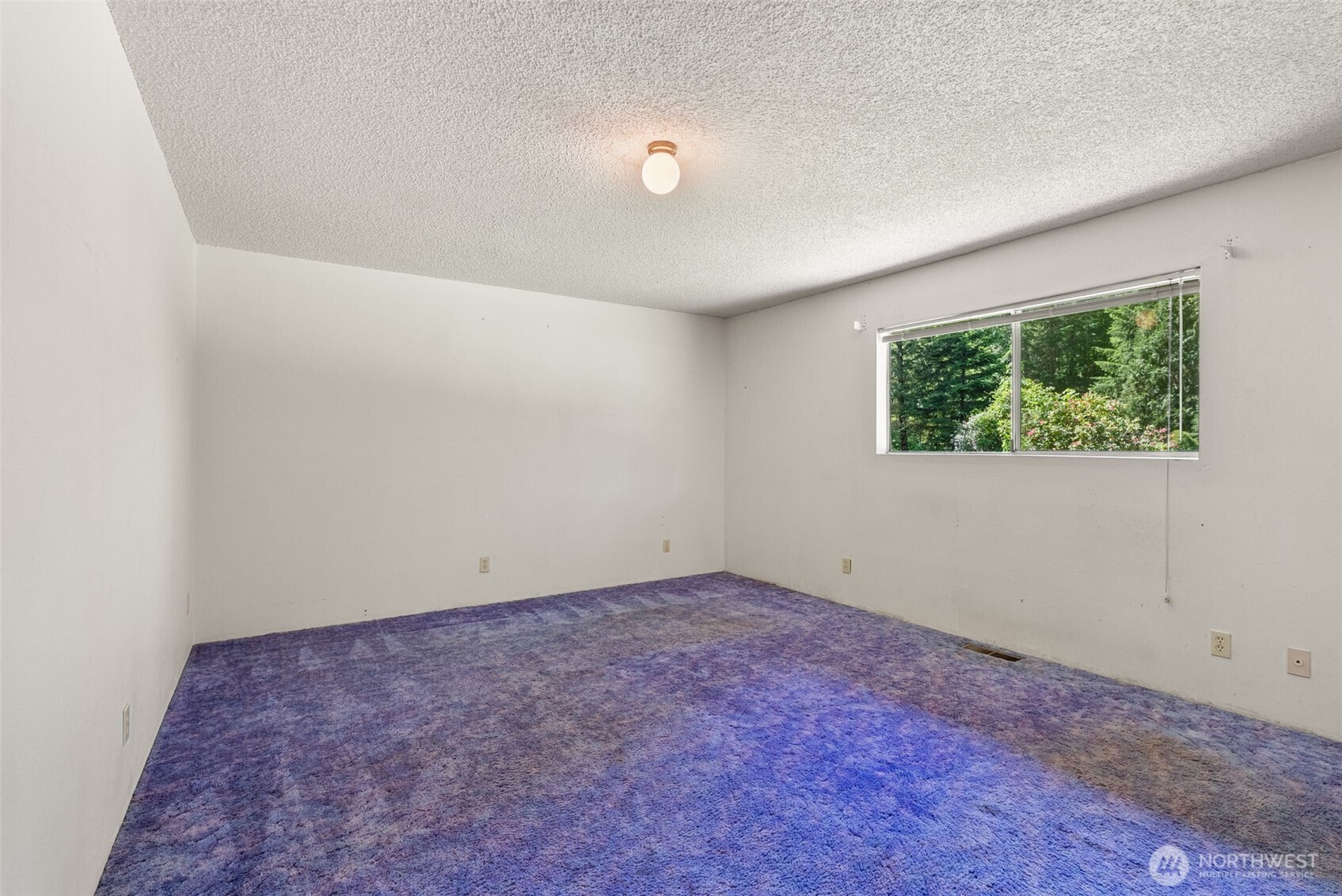 155 Bonell Road Randle, WA 98377 - Photo 19 of 38 an empty room with a window