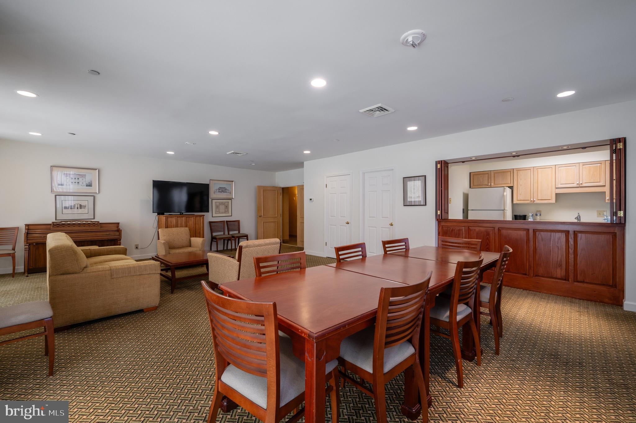 5000 Battery Lane, Unit 207 Bethesda, MD 20814 - Photo 28 of 34 a view of a dining room with furniture