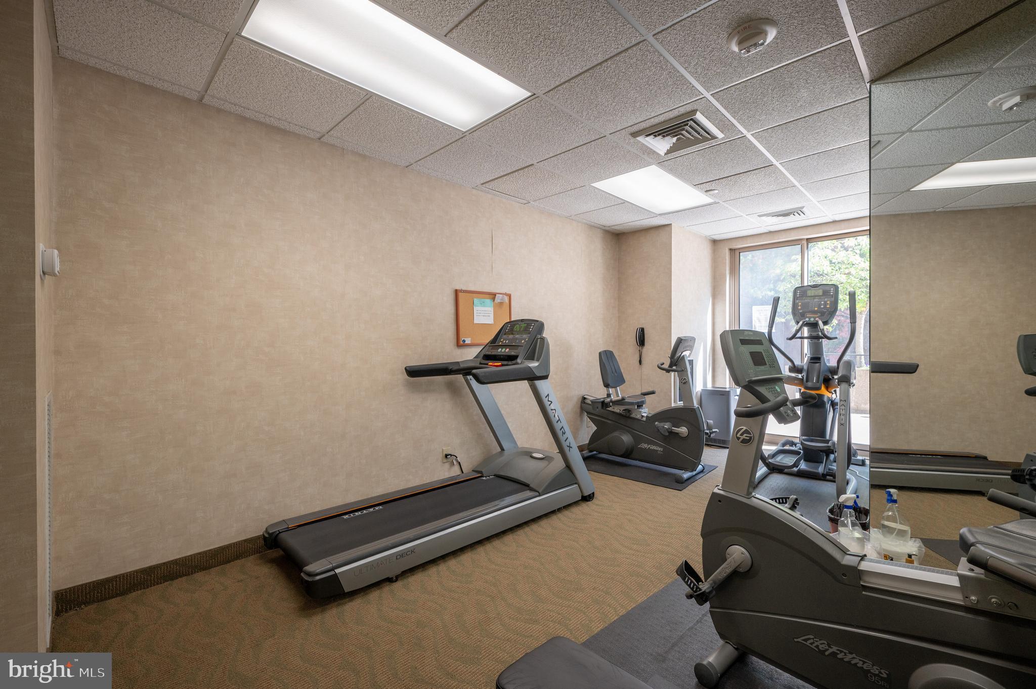 5000 Battery Lane, Unit 207 Bethesda, MD 20814 - Photo 31 of 34 a room with gym equipment